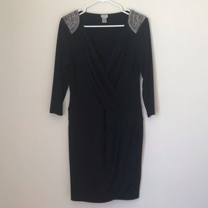 Black Caché cocktail dress with chain detail